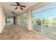 Spacious sunroom with tile floors and golf course view at 402 W Beechnut Pl, Sun Lakes, AZ 85248