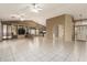 Spacious living room with high ceilings and tile flooring at 402 W Beechnut Pl, Sun Lakes, AZ 85248