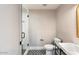 Modern bathroom with a walk-in shower, updated vanity, and patterned tile floor at 8014 E Del Tesoro Dr, Scottsdale, AZ 85258