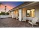 Relaxing patio area featuring comfortable seating and a view of the home's interior at 8014 E Del Tesoro Dr, Scottsdale, AZ 85258