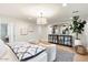 Light and airy bedroom with hardwood floors and stylish decor at 8014 E Del Tesoro Dr, Scottsdale, AZ 85258