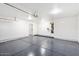Spacious garage with epoxy flooring and ample storage space at 8014 E Del Tesoro Dr, Scottsdale, AZ 85258