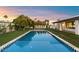 Inviting swimming pool with clean lines and a spacious deck at 8014 E Del Tesoro Dr, Scottsdale, AZ 85258