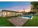 Relaxing backyard with a sparkling pool and spacious patio perfect for entertaining at 8014 E Del Tesoro Dr, Scottsdale, AZ 85258
