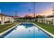 Inviting swimming pool with a clean design and beautiful reflection of the sky at 8014 E Del Tesoro Dr, Scottsdale, AZ 85258