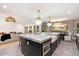 Spacious kitchen with large island, stainless steel appliances, and stylish cabinetry at 8014 E Del Tesoro Dr, Scottsdale, AZ 85258