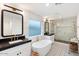 Elegant bathroom with soaking tub, walk-in shower, and modern fixtures at 8014 E Del Tesoro Dr, Scottsdale, AZ 85258