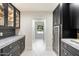 Well-appointed butler's pantry with wine cooler and ample storage at 8014 E Del Tesoro Dr, Scottsdale, AZ 85258