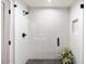 Elegant shower with subway tile and a frameless glass enclosure at 8014 E Del Tesoro Dr, Scottsdale, AZ 85258