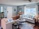 Living room with hardwood floors and light blue walls at 14415 N Boxwood Ln # D, Fountain Hills, AZ 85268