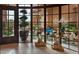 Grand entryway with glass doors and views to a tranquil courtyard at 9808 E Honey Mesquite Dr, Scottsdale, AZ 85262