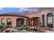 Peaceful backyard with a koi pond and bridge at 9808 E Honey Mesquite Dr, Scottsdale, AZ 85262