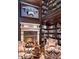 Spacious library with fireplace and comfortable seating at 9808 E Honey Mesquite Dr, Scottsdale, AZ 85262