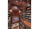 Two story library with fireplace and balcony overlook at 9808 E Honey Mesquite Dr, Scottsdale, AZ 85262