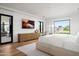 Main bedroom with a large window, walk-in closet, and stunning views at 5815 N Kiva Ln, Paradise Valley, AZ 85253