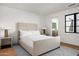 Guest bedroom with ensuite bathroom and hardwood floors at 5815 N Kiva Ln, Paradise Valley, AZ 85253