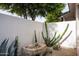 Serene private courtyard with stone fountain and desert landscaping at 5815 N Kiva Ln, Paradise Valley, AZ 85253