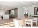 Light and airy dining area with a view of the kitchen at 5815 N Kiva Ln, Paradise Valley, AZ 85253