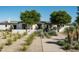 Landscaped front yard with a walkway leading to the front door at 5815 N Kiva Ln, Paradise Valley, AZ 85253