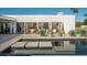 Stunning pool and patio with a white brick home backdrop at 5815 N Kiva Ln, Paradise Valley, AZ 85253
