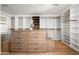 Large walk-in closet with ample shelving and drawers at 5815 N Kiva Ln, Paradise Valley, AZ 85253