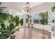 Dining room with hardwood floors, a chandelier, and french doors at 4613 E Briarwood Ter, Phoenix, AZ 85048