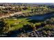 Aerial view of a golf course and surrounding neighborhood at 10401 N Saguaro Blvd # 224, Fountain Hills, AZ 85268