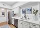 Modern kitchen with stainless steel appliances and white cabinets at 10401 N Saguaro Blvd # 224, Fountain Hills, AZ 85268