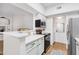 Modern kitchen with white cabinetry and stainless steel appliances at 10401 N Saguaro Blvd # 224, Fountain Hills, AZ 85268
