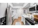 Updated kitchen featuring stainless steel appliances and tile flooring at 10401 N Saguaro Blvd # 224, Fountain Hills, AZ 85268
