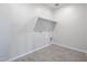 Laundry room with built-in shelving and tile flooring at 35560 W La Paz St, Maricopa, AZ 85138