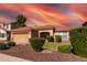 One-story home with tan exterior, red tile roof, and landscaped yard at 2754 W Tanner Ranch Rd, San Tan Valley, AZ 85144