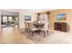 Elegant dining room with a large table and access to living area at 2754 W Tanner Ranch Rd, San Tan Valley, AZ 85144