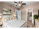 Bright bedroom with ceiling fan and ample closet space at 2754 W Tanner Ranch Rd, San Tan Valley, AZ 85144