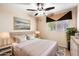 Serene bedroom with ceiling fan and neutral decor at 2754 W Tanner Ranch Rd, San Tan Valley, AZ 85144