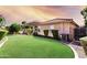 Landscaped backyard with a grassy lawn and a casita at 2754 W Tanner Ranch Rd, San Tan Valley, AZ 85144