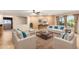 Comfortable living room with ample seating and neutral decor at 2754 W Tanner Ranch Rd, San Tan Valley, AZ 85144