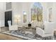 Spacious living area showcasing a large window and comfortable seating arrangement at 8757 E Lariat Ln, Scottsdale, AZ 85255