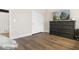 Serene bedroom with a large dresser and plenty of closet space at 8757 E Lariat Ln, Scottsdale, AZ 85255