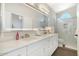 Elegant bathroom with double vanity, marble countertops, and a walk-in shower at 8757 E Lariat Ln, Scottsdale, AZ 85255