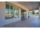 Covered patio with access to backyard and pool area at 1912 E Gemini Pl, Chandler, AZ 85249
