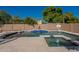 Resort style backyard oasis with pool, spa, and diving board at 1912 E Gemini Pl, Chandler, AZ 85249