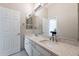 Bathroom boasts double sinks, granite countertop, and modern fixtures at 1912 E Gemini Pl, Chandler, AZ 85249