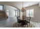 Bright dining room featuring a round table and chandelier at 1912 E Gemini Pl, Chandler, AZ 85249