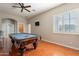 Game room with pool table, hardwood floors, and ceiling fan at 1912 E Gemini Pl, Chandler, AZ 85249