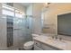 Modern bathroom with a large walk-in shower and quartz countertop at 1912 E Gemini Pl, Chandler, AZ 85249
