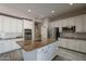 Kitchen island with granite countertops and stainless steel appliances at 1912 E Gemini Pl, Chandler, AZ 85249