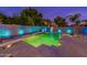 Night view of a refreshing pool and spa with colorful lighting at 1912 E Gemini Pl, Chandler, AZ 85249