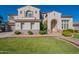 Two-story house with a landscaped front yard and walkway at 1912 E Gemini Pl, Chandler, AZ 85249