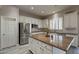 Kitchen with stainless steel appliances and granite countertops at 1912 E Gemini Pl, Chandler, AZ 85249